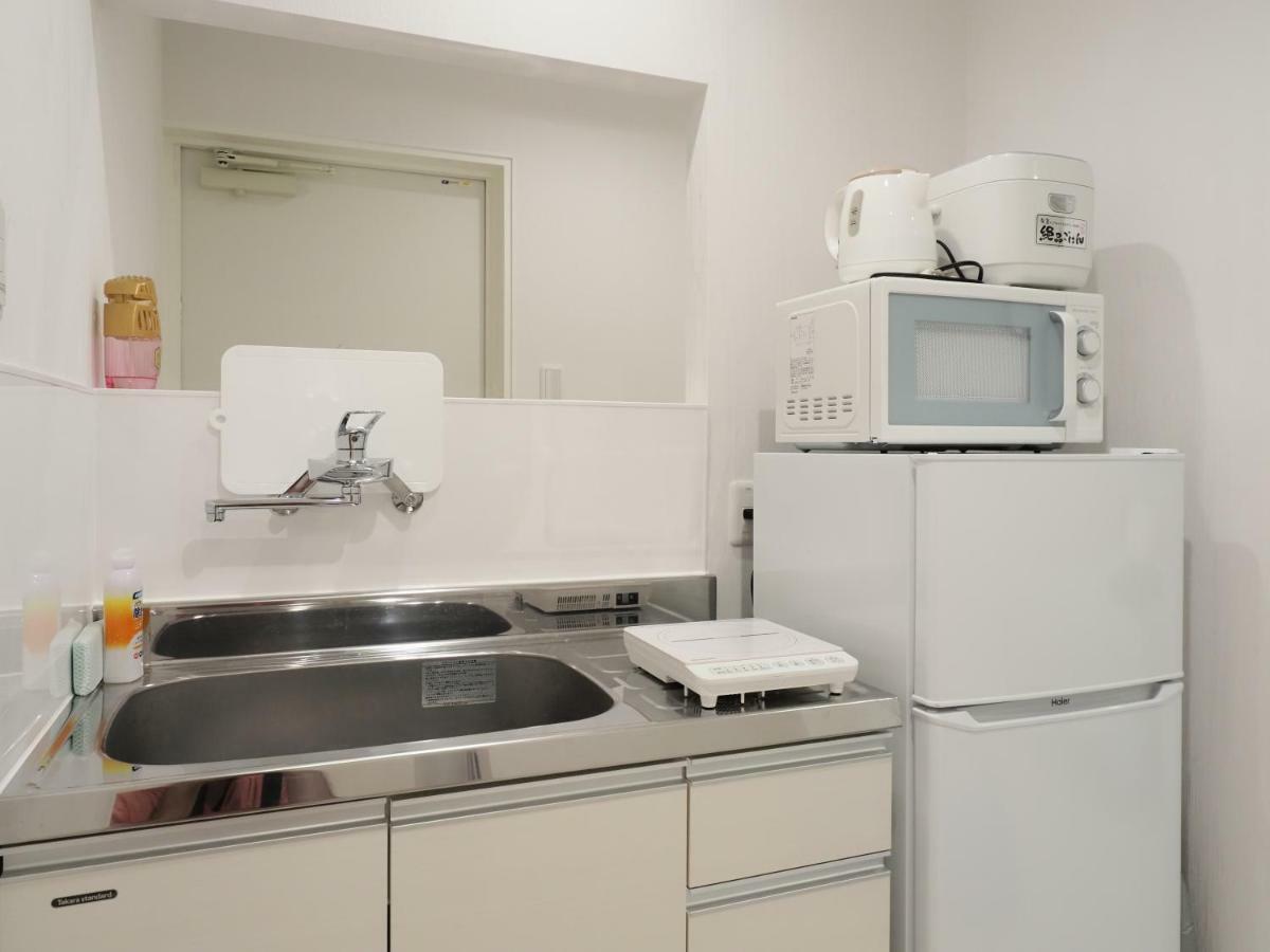 Kukuru House Apartment นาฮะ ภายนอก รูปภาพ
